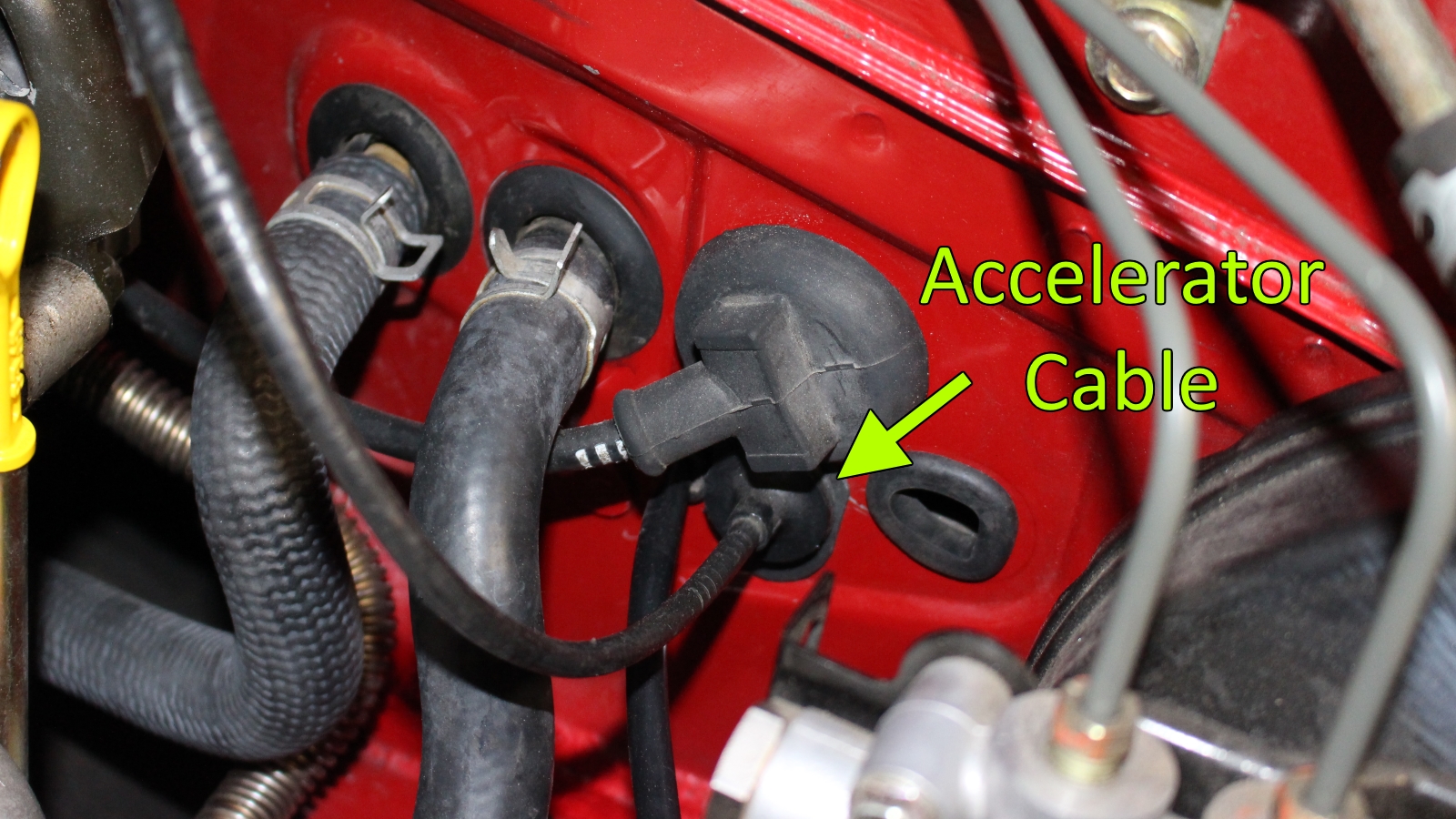 Miata accelerator cable mounted through firewall